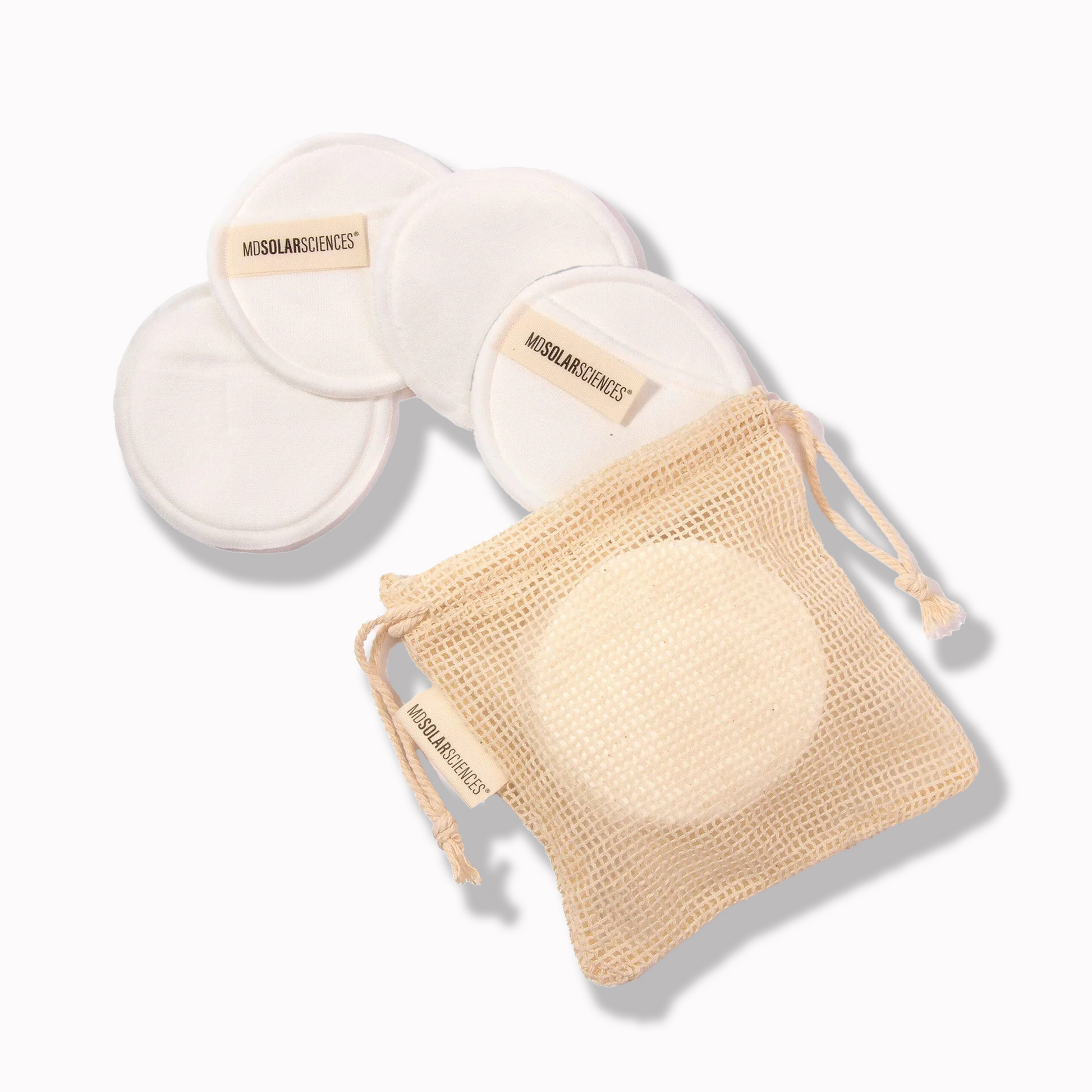 Three reusable cotton pads with a drawstring bag featuring the brand 'MDSOLAR'