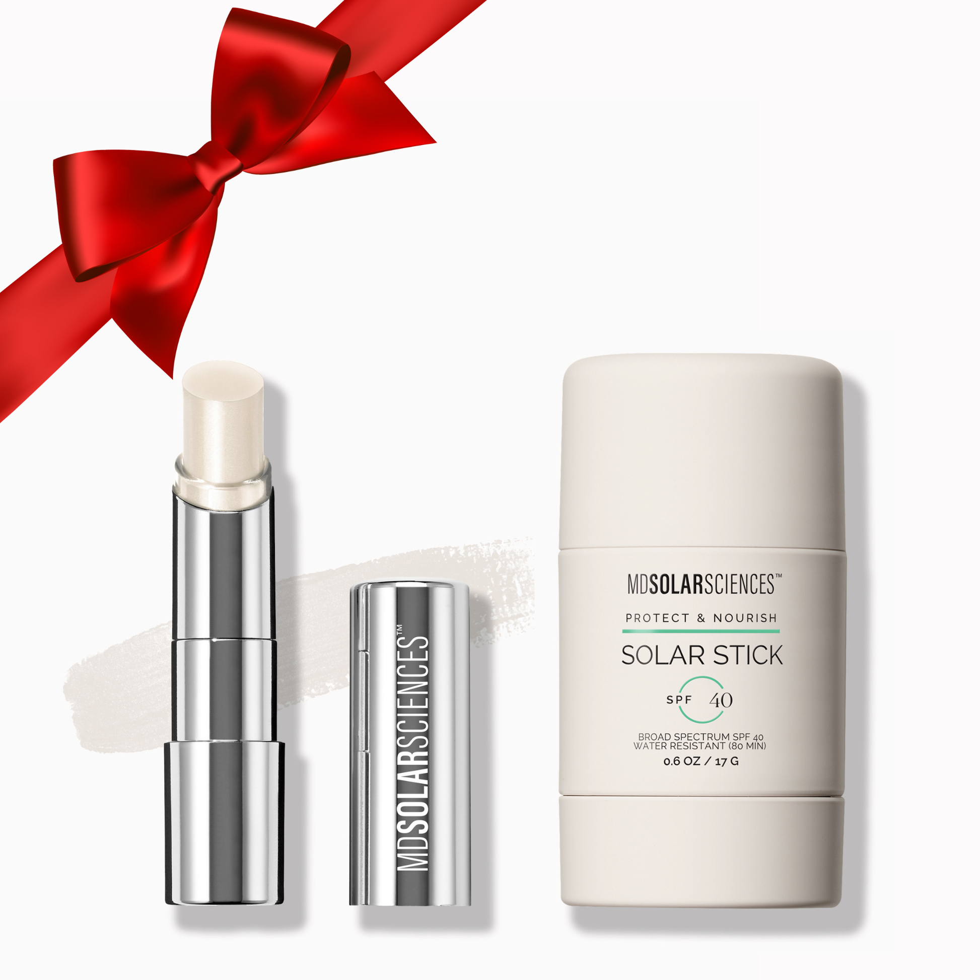 Solar Stick and lip balm with a red ribbon