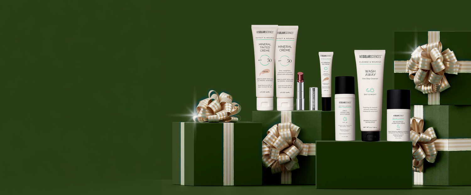 Cosmetic products on green boxes with decorative bows against a green background
