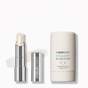 Solar Stick and clear Lip Balm by MDSolarSciences on a white background