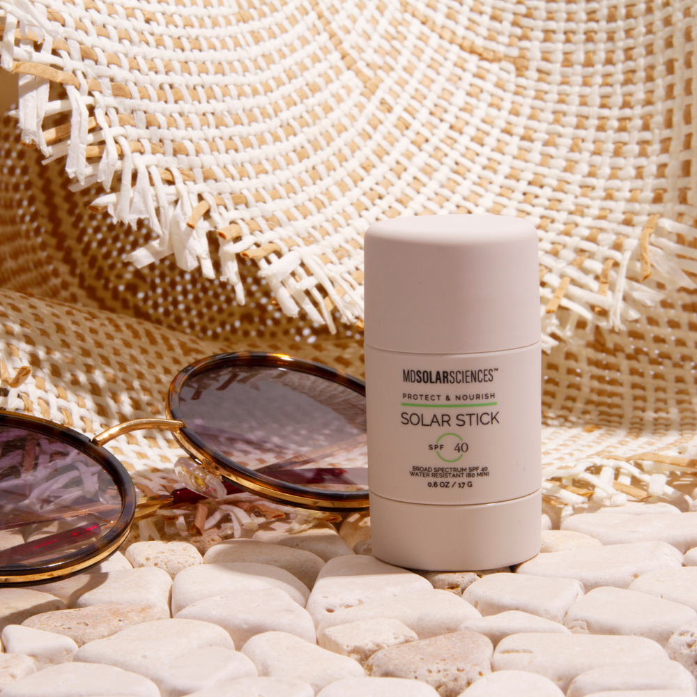 MDSolarSciences SPF stick and cleanser lifestyle photo