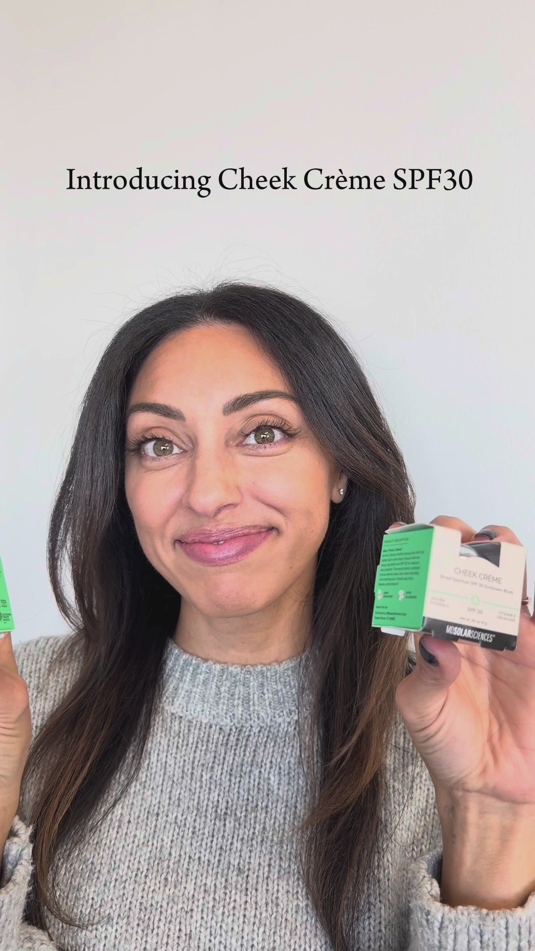 Load video: video of model applying cheek crème in both colors